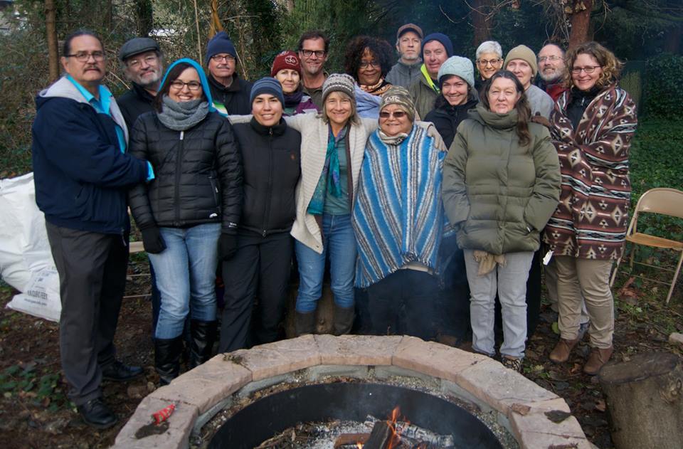 The Doctrine of Discovery Coalition met in January 2016 at Seattle Mennonite Church, opening their time with a ceremony led by Steve Darden (Navajo – Human Rights Commissioner for the Diné Nation) and Mark MacDonald (Bishop for Indigenous Peoples for the Anglican Church of Canada and also President for North America for the World Council of Churches). (l. to r.) (front row) Steve Darden, Erica Littlewolf, Sarah Augustine, Sheri Hostetler, Iris de León-Hartshorn, Patty Burdette; (middle row) Mark MacDonald, Ken Gingerich, Anita Amstutz, Michelle Armster, Katerina Friesen, Jennifer Delanty, Karin Kaufman Wall; (back row) Todd Wynyard, Jonathan Neufeld, John Stoesz, Pat Shaver, Weldon Nisley. (DoD Coalition photo)