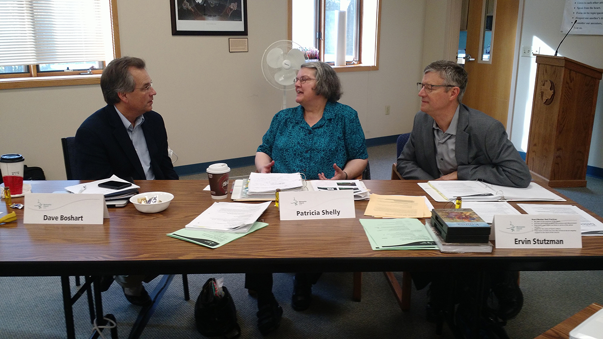 Moderator-elect David Boshart, moderator Patty Shelley and executive director Ervin Stutzman discuss a new proposal for the Delegate Assembly in Orlando 2017. Photo by Janie Beck Kreider.