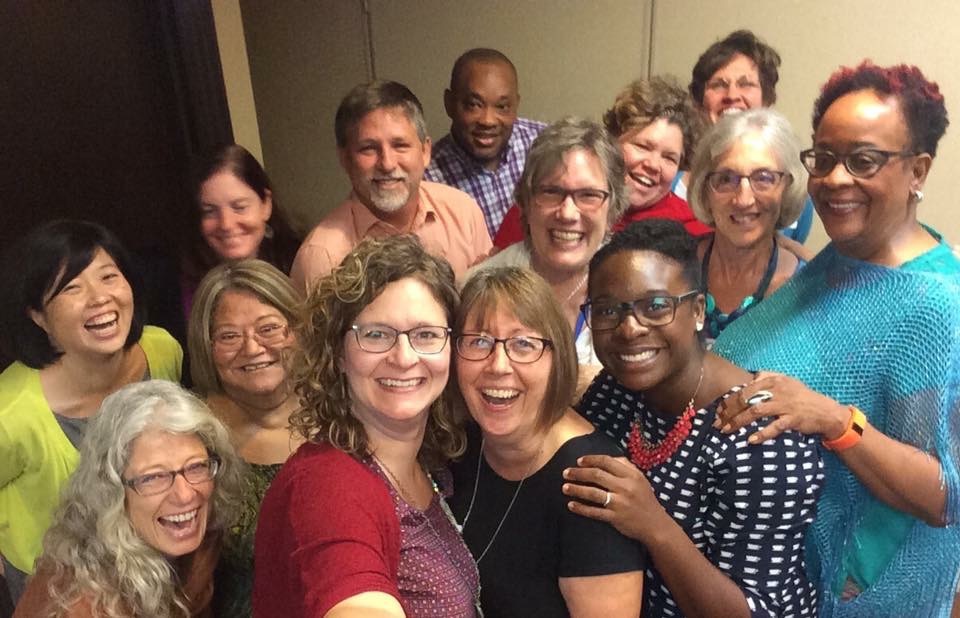 Intercultural Development Inventory-qualified administrators met Aug. 9–11 in Kansas City, Missouri (l. to r.): (front) Elaine Enns, Karin Kaufman Wall, Lorraine Stutzman Amstutz, Chantelle Todman Moore, Michelle Armster; (second row) Sue Park-Hur, Iris de León-Hartshorn, Jan Ellen Reid, Ruth Yoder Wenger; (third row) Susannah Lepley, Darin Short, Linda Herr; (fourth row) Glen Alexander Guyton, Shana Boshart. (Not pictured: Carlos Romero, Rachel Stoltzfus) (Photo provided)