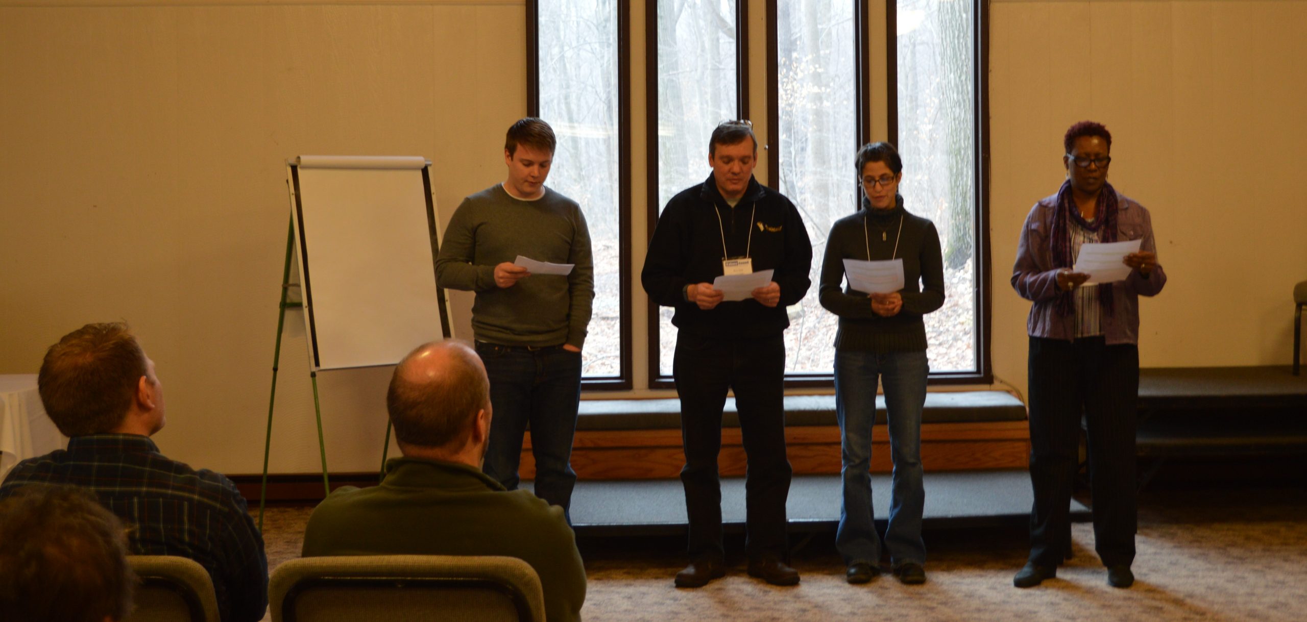 Participants in the Values-based Leadership Program — grouped by personality type — present on 1 Corinthians 13 during their February meeting. (Laurelville Mennonite Church Center photo)