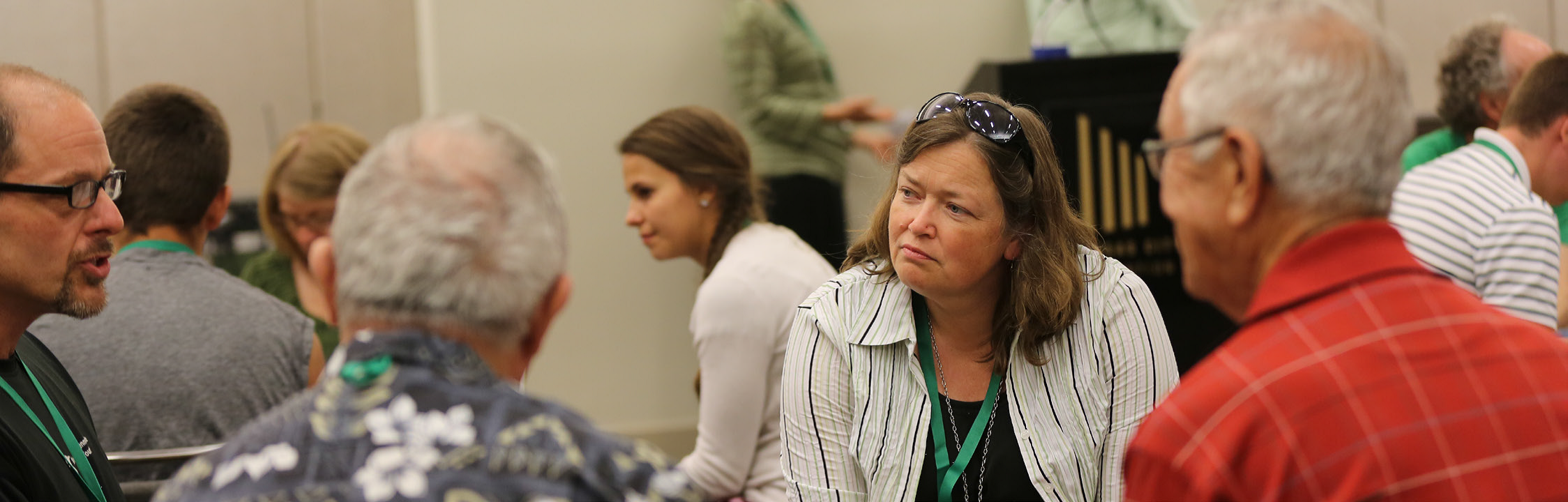 Loretta Miller listens as group members express views concerning ISIS. Photo Credit: Meg Short