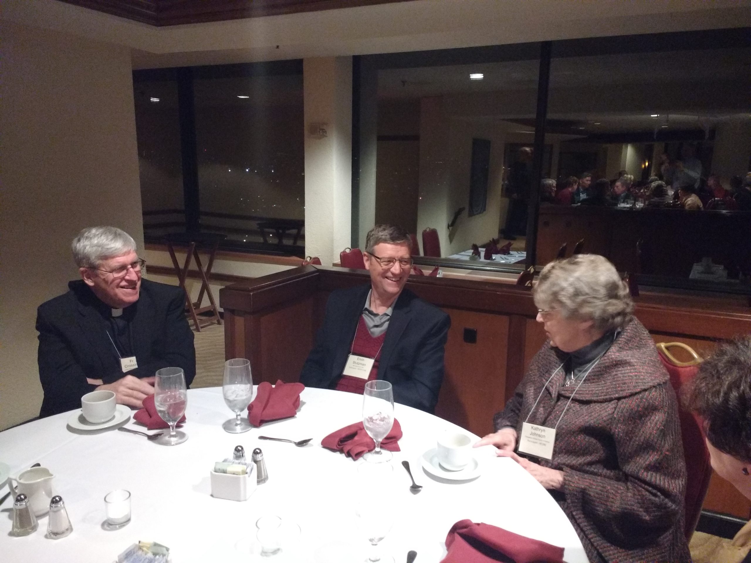 Ervin Stutzman in a dinner conversation at the annual convocation of Christian Churches Together with Fr. John Crossin pf the U.S. Conference of Catholic Bishops and Kathryn Johnson of the Evangelical Lutheran Church in America, who give leadership to ecumenical relations for their churches.