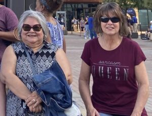 Iris de León-Hartshorn and Shelley Buller at a 2022 staff retreat.