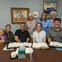 Members of Eden Mennonite Church in Burns, Kansas, work together to create notes for the Anabaptism at 500 Bible study project. Photo provided by John Roth.